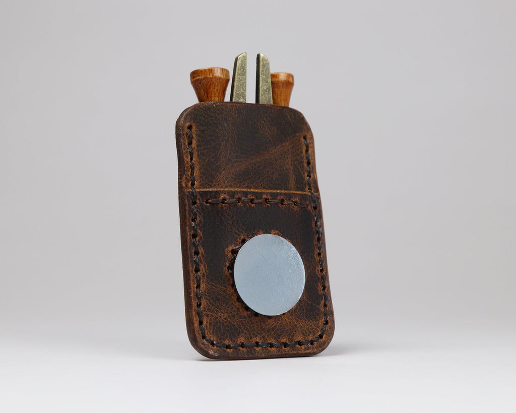 Handmade leather golf pocket caddy crafted for easy access to essential golf accessories.